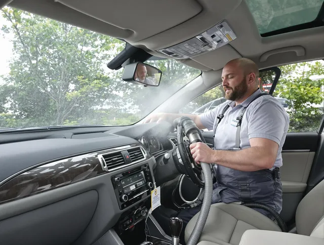 Lynnfield Air Duct Cleaning specialist performing professional car duct cleaning in Lynnfield