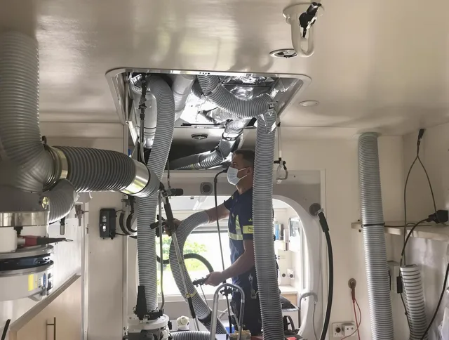 Lynnfield Air Duct Cleaning specialist performing precise mobile home duct cleaning in Lynnfield
