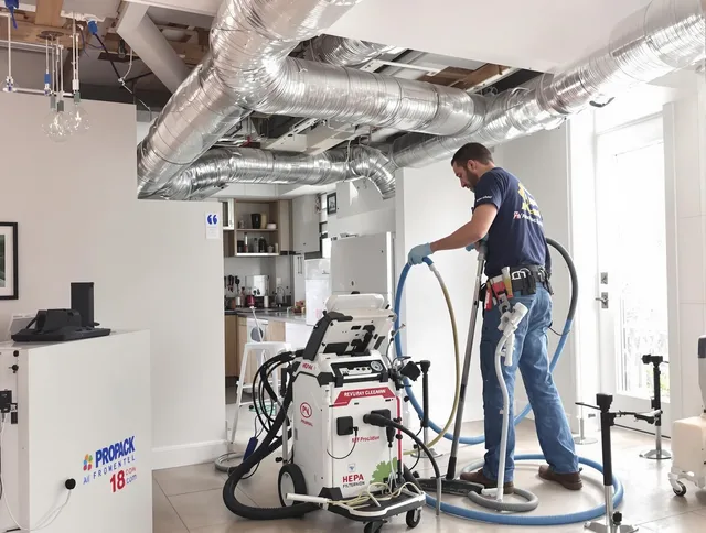 Lynnfield Air Duct Cleaning technician performing advanced pure duct cleaning with specialized equipment in Lynnfield